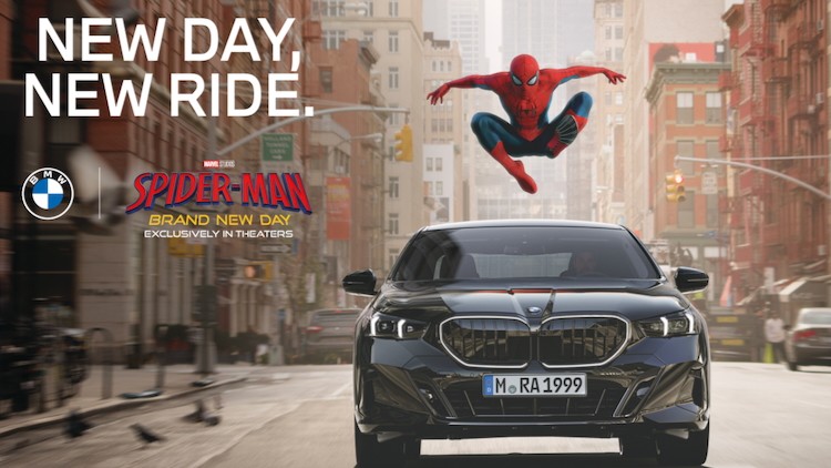 Spider-man jumps on BMW car.